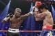 Timothy Bradley throws a punch against Manny Pacquiao in the eighth round of their WBO world welterweight title fight Saturday, June 9, 2012, in Las Vegas. (AP Photo/Julie Jacobson)