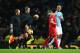 MANCHESTER, ENGLAND - DECEMBER 26: Luis Suarez of Liverpool talks to Vincent Kompany of Manchester City as they walk off for half time during the Barclays Premier League match between Manchester City and Liverpool at Etihad Stadium on December 26, 2013 in Manchester, England. (Photo by Alex Livesey/Getty Images)