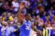 INDIANAPOLIS, IN - MARCH 28: Julius Randle #30 of the Kentucky Wildcats celebrates defeating the Louisville Cardinals 74 to 69 during the regional semifinal of the 2014 NCAA Men's Basketball Tournament at Lucas Oil Stadium on March 28, 2014 in Indianapolis, Indiana. (Photo by Andy Lyons/Getty Images)