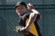 Pittsburgh Pirates pitcher Jameson Taillon throws a bullpen session during the baseball team's spring training workout in Bradenton, Fla., Thursday, Feb. 20, 2014. (AP Photo/Gene J. Puskar)
