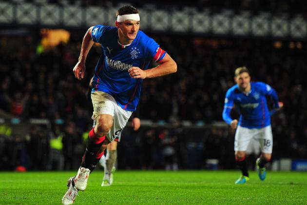 GLASGOW, SCOTLAND - NOVEMBER 6:  Lee McCulloch of Rangers celebrates with his team-mates after scoring the opening goal from the penalty spot during the Scottish League One match between Rangers and Dunfermline at Ibrox Stadium on November 6, 2013 in Glasgow, Scotland. (Photo by Mark Runnacles/Getty Images)