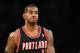 Portland Trail Blazers forward LaMarcus Aldridge walks on the court against the Los Angeles Lakers during the first half of an NBA basketball game in Los Angeles, Tuesday, April 1, 2014. (AP Photo/Danny Moloshok)