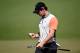 AUGUSTA, GA - APRIL 10: Rory McIlroy of Northern Ireland looks at his golf ball on the second hole during the first round of the 2014 Masters Tournament at Augusta National Golf Club on April 10, 2014 in Augusta, Georgia. (Photo by Harry How/Getty Images)