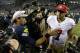 Seattle Seahawks' Russell Wilson, left, talks to San Francisco 49ers' Colin Kaepernick (7) after the NFL football NFC Championship game Sunday, Jan. 19, 2014, in Seattle. The Seahawks won 23-17 to advance to Super Bowl XLVIII. (AP Photo/Matt Slocum)