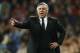 Real's coach Carlo Ancelotti directs his players during a Champions League quarterfinal first leg soccer match between Real Madrid and Borussia Dortmund at the Santiago Bernabeu stadium in Madrid, Spain, Wednesday, April 2, 2014. (AP Photo/Andres Kudacki)