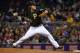 Pittsburgh Pirates starting pitcher Gerrit Cole delivers during the fourth inning of a baseball game against the St. Louis Cardinals in Pittsburgh on Friday, April 4, 2014. (AP Photo/Gene J. Puskar)