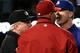 Dodgers hitting coach Mark McGwire and Diamondbacks manager Kirk Gibson exchanged words during a benches-clearing brawl last June.