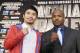 Manny Pacquiao, left of the Philippines, and Tim Bradley pose at a news conference to promote their upcoming WBO welterweight championship boxing rematch in Beverly Hills, Calif., Tuesday, Feb. 4, 2014. Pacquiao and Bradley's first match on June 9, 2012 was a split decision in favor of Bradley, which ended Pacquiao's welterweight title reign as well as his seven-year, 15-bout winning streak. Pacquiao vs. Bradley 2 will take place Saturday, April 12, 2014, in Las Vegas. (AP Photo/Reed Saxon)