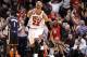 Chicago Bulls forward Taj Gibson (22) celebrates after his dunk off a rebound during the second half of an NBA basketball game against the Indiana Pacers Monday, March 24, 2014, in Chicago. The Bulls won 89-77. (AP Photo/Charles Rex Arbogast)