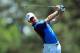 AUGUSTA, GA - APRIL 12: Rory McIlroy of Northern Ireland watches his approach shot on the 14th hole during the third round of the 2014 Masters Tournament at Augusta National Golf Club on April 12, 2014 in Augusta, Georgia. (Photo by David Cannon/Getty Images)