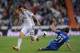 MADRID, SPAIN - APRIL 12: Angel Di Maria (L) of Real Madrid gets past Mane of Almeria during the La Liga match between Real Madrid and Almeria at Santiago Bernabeu stadium on April 12, 2014 in Madrid, Spain. (Photo by Denis Doyle/Getty Images)