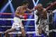 Manny Pacquiao, left, of the Philippines, drives Timothy Bradley into the ropes in their WBO welterweight title boxing bout Saturday, April 12, 2014, in Las Vegas. Pacquiao won by unanimous decision. (AP Photo/Isaac Brekken)