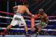 LAS VEGAS, NV - APRIL 12: Manny Pacquiao catches Timothy Bradley off balance at the MGM Grand Garden Arena on April 12, 2014 in Las Vegas, Nevada. (Photo by Jeff Gross/Getty Images)