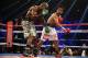 LAS VEGAS, NV - APRIL 12: Manny Pacquiao follows through on a right hand to Timothy Bradley at the MGM Grand Garden Arena on April 12, 2014 in Las Vegas, Nevada. (Photo by Jeff Gross/Getty Images)