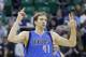 Dallas Mavericks' Dirk Nowitzki (41) celebrates his 3 pointer in the second half during an NBA basketball game against the Utah Jazz Tuesday, April 8, 2014, in Salt Lake City. (AP Photo/Rick Bowmer)