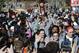 Connecticut women's basketball player Bria Hartley holds the championship trophy as she arrives with the team on campus for a rally celebrating their NCAA title, Wednesday, April 9, 2014, in Storrs, Conn. (AP Photo/Jessica Hill)