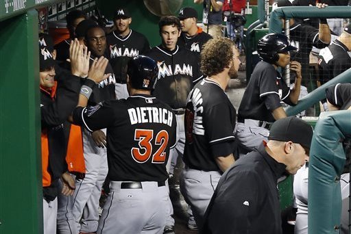 Miami Marlins pitcher Mike Dunn holds a Jose Fernandez jersey