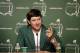 Bubba Watson, speaks during a press conference wearing his green jacket after winning the Masters golf tournament Sunday, April 13, 2014, in Augusta, Ga. (AP Photo/Chris Carlson)