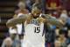 Sacramento Kings center DeMarcus Cousins tears at his jersey after drawing a technical foul against the Minnesota Timberwolves during the second half of an NBA basketball game in Sacramento, Calif., on Sunday, April 13, 2014. The Kings won 106-103.(AP Photo/Steve Yeater)
