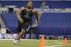 Arkansas State defensive lineman Ryan Carrethers runs a drill at the NFL football scouting combine in Indianapolis, Monday, Feb. 24, 2014. (AP Photo/Michael Conroy)