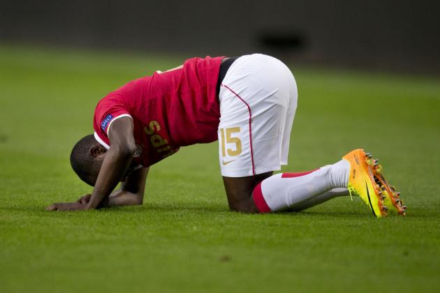 PSV's Jetro Willems lies injured on the pitch before retiring from the game during the Group B Europa League soccer match between PSV Eindhoven and Bulgaria's PFC Ludogorets Razgrad in Eindhoven, Netherlands, Thursday, Sept. 19, 2013. (AP Photo/Peter Dejong)