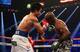 LAS VEGAS, NV - APRIL 12: Manny Pacquiao lands a right hand to the head of Timothy Bradley at the MGM Grand Garden Arena on April 12, 2014 in Las Vegas, Nevada. (Photo by Jeff Gross/Getty Images)