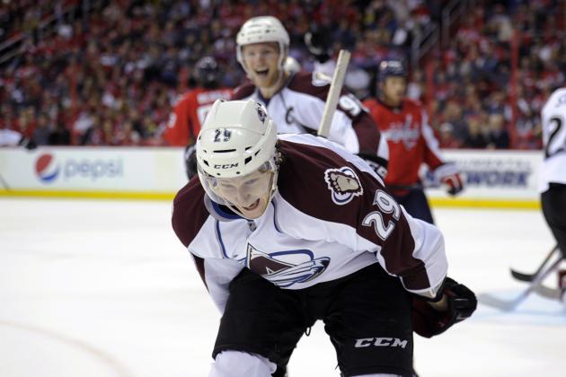 Colorado Avalanche center Nathan MacKinnon (29) celebrates his goal during the second period an NHL hockey game against the Washington Capitals, Saturday, Oct. 12, 2013, in Washington. (AP Photo/Nick Wass)
