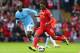 LIVERPOOL, ENGLAND - APRIL 13: Yaya Toure of Manchester City competes with Daniel Sturridge of Liverpool during the Barclays Premier League match between Liverpool and Manchester City at Anfield on April 13, 2014 in Liverpool, England. (Photo by Alex Livesey/Getty Images)