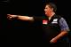 LONDON, ENGLAND - DECEMBER 28: Gary Anderson of Scotland in action during his third round match against Michael van Gerwen of Holland on day thirteen of the Ladbrokes.com World Darts Championship at Alexandra Palace on December 28, 2013 in London, England. (Photo by Harry Engels/Getty Images)