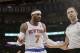 New York Knicks' Carmelo Anthony (7) argues a call during the second half of an NBA basketball game against the Brooklyn Nets Wednesday, April 2, 2014, in New York. The Knicks won the game 110-81. (AP Photo/Frank Franklin II)