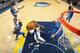 MEMPHIS, TN - APRIL 16: Mike Conley #11 of the Memphis Grizzlies shoots against the Dallas Mavericks on April 16, 2014 at FedExForum in Memphis, Tennessee. NOTE TO USER: User expressly acknowledges and agrees that, by downloading and or using this photograph, User is consenting to the terms and conditions of the Getty Images License Agreement. Mandatory Copyright Notice: Copyright 2014 NBAE (Photo by Joe Murphy/NBAE via Getty Images)