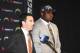 San Diego Chargers general manager Tom Telesco, left, talks about Chargers first round NFL draft pick offensive tackle D.J. Fluker, right, at a news conference held at the Chargers facility Friday, April 26, 2013 in San Diego. (AP Photo/Denis Poroy)
