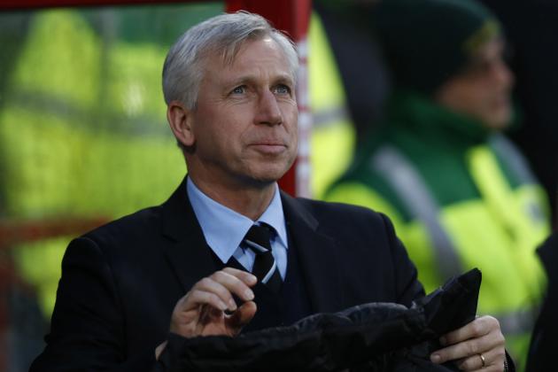 Newcastle United's manager Alan Pardew looks on from the dugout before the start of their English Premier League soccer match against Crystal Palace at Selhurst Park, London, Saturday, Dec. 21, 2013. (AP Photo/Sang Tan)