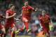 10ThingstoSeeSports - Liverpool's Philippe Coutinho, center, celebrates with teammate Steven Gerrard, left, after he scored the third goal of the game for his side during their English Premier League soccer match against Manchester City at Anfield in Liverpool, England, Sunday, April 13, 2014. (AP Photo/Clint Hughes, File)