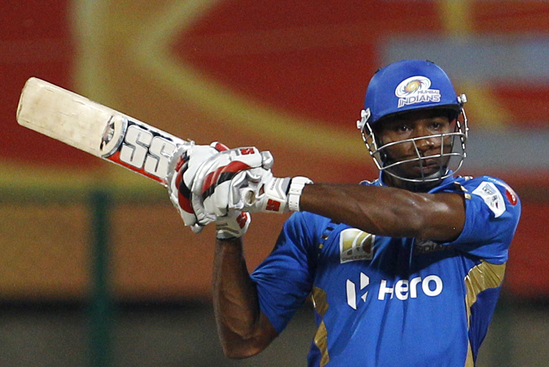 Mumbai Indians' batsman Kieron Pollard bats during the Champions League Twenty20 cricket match against Cape Cobras in Bangalore, India, Friday, Sept. 30, 2011. (AP Photo/Aijaz Rahi)
