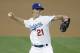 Los Angeles Dodgers starting pitcher Zack Greinke throws to the Arizona Diamondbacks during first inning of a baseball game in Los Angeles, Friday, April 18, 2014. (AP Photo/Chris Carlson)
