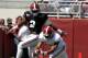 Wide receiver ArDarius Stewart (13) catches a deflected pass over defensive back Tony Brown (2) during Alabama's A-Day NCAA college football spring game on Saturday, April 19, 2014, in Tuscaloosa, Ala. (AP Photo/Butch Dill)