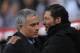 MADRID, SPAIN - MAY 17: Head coach Jose Mourinho (L) of Real Madrid greets Head coach Diego Simeone of Atletico de Madrid before the start of the Copa del Rey Final between Real Madrid CF and Club Atletico de Madrid at Estadio Santiago Bernabeu on May 17, 2013 in Madrid, Spain. (Photo by Denis Doyle/Getty Images)