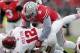 Ohio State linebacker Ryan Shazier, top, tackles Indiana running back Stephen Houston during the second quarter of an NCAA college football game Saturday, Nov. 23, 2013, in Columbus, Ohio. (AP Photo/Jay LaPrete)