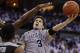 FILE - In this March 8, 2014 file photo, Creighton's Doug McDermott (3) goes for a layup against Providence's LaDontae Henton (23) and Providence's Kadeem Batts (10) in an NCAA college basketball game in Omaha, Neb. McDermott was selected to The Associated Press All-America team, released Monday, March 31, 2014. (AP Photo/Nati Harnik)