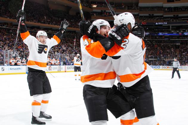 NEW YORK, NY - APRIL 20: Luke Schenn #22, Michael Raffl #12 and Andrew MacDonald #47 of the Philadelphia Flyers celebrate after a second-period goal against the New York Rangers in Game Two of the First Round of the 2014 Stanley Cup Playoffs at Madison Square Garden on April 20, 2014 in New York City. (Photo by Scott Levy/NHLI via Getty Images)