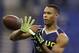 Vanderbilt wide receiver Jordan Matthews makes a catch during a drill at the NFL football scouting combine in Indianapolis, Sunday, Feb. 23, 2014. (AP Photo/Michael Conroy)