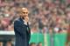 Munich head coach Pep Guardiola reacts during the German soccer cup, DFB Pokal, semifinal match between FC Bayern Munich and FC Kaiserslautern in the Allianz Arena in Munich, Germany, on Wednesday, April 16. 2014. (AP Photo/Kerstin Joensson)