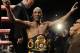 Bernard Hopkins, of the United States, leaves the ring after defeating Beibut Shumenov, of Kazakhstan, by a split decision after their IBF, WBA and IBA Light Heavyweight World Championship unification boxing match, Sunday, April 20, 2014, in Washington. Hopkins won by a split decision. (AP Photo/Luis M. Alvarez)