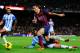 BARCELONA, SPAIN - JANUARY 26: Cristian Tello of FC Barcelona duels for the ball with Sergio Sanchez of Malaga CF during the La Liga match between FC Barcelona and Malaga CF at Camp Nou on January 26, 2014 in Barcelona, Spain. (Photo by David Ramos/Getty Images)