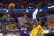 INDIANAPOLIS, IN - APRIL 19: Paul Milsap #4 of the Atllanta Hawks shoots the ball while defended by Roy Hibbert #55 of the Indiana Pacers in Game 1 of the Eastern Conference Quarterfinals during the 2014 NBA Playoffs at Bankers Life Fieldhouse on April 19, 2014 in Indianapolis, Indiana. NOTE TO USER: User expressly acknowledges and agrees that, by downloading and or using this photograph, User is consenting to the terms and conditions of the Getty Images License Agreement. (Photo by Andy Lyons/Getty Images)