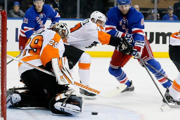 NEW YORK, NY - APRIL 20: Rick Nash #61 of the New York Rangers shoots the puck as goalie Ray Emery #29 of the Philadelphia Flyers makes the stop in Game Two of the First Round of the 2014 NHL Stanley Cup Playoffs at Madison Square Garden on April 20, 2014 in New York City. The Flyers won 4-2. (Photo by Paul Bereswill/Getty Images)