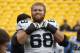 North Carolina offensive tackle James Hurst (68) warms up before an NCAA football game between Pittsburgh and North Carolina, Saturday, Nov. 16, 2013 in Pittsburgh. (AP Photo/Keith Srakocic)