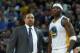 Mar 11, 2014; Oakland, CA, USA; Golden State Warriors head coach Mark Jackson speaks with center Jermaine O'Neal (7) on the sideline during the first quarter against the Dallas Mavericks at Oracle Arena. Mandatory Credit: Kelley L Cox-USA TODAY Sports