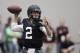 Texas A&M quarterback Johnny Manziel passes the ball during a drill at pro day for NFL football representatives in College Station, Texas, Thursday, March 27, 2014. (AP Photo/Patric Schneider)
